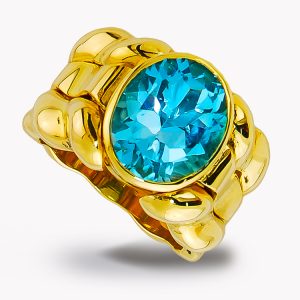 Item #21306 triple flowing lines blue topaz yellow gold ring