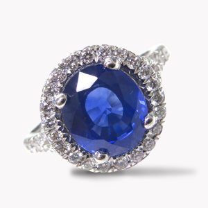 23916 Blue Sapphire and Diamond Halo Ring in White Gold