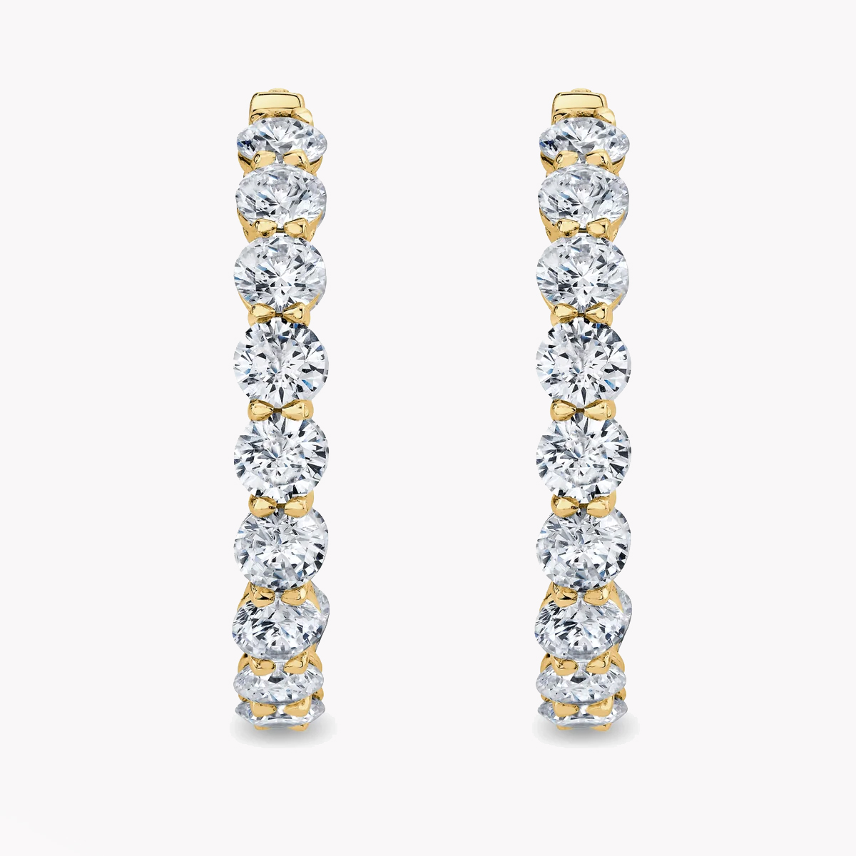 Diamond J Hoops in Yellow Gold