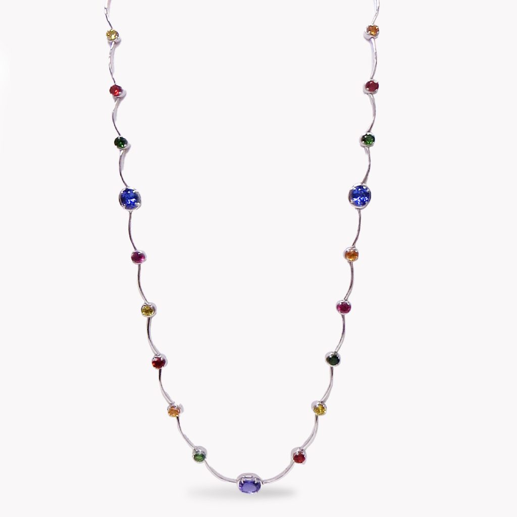 Item #23579 Long White Gold Cascade Necklace With Multi-Color Gemstones
